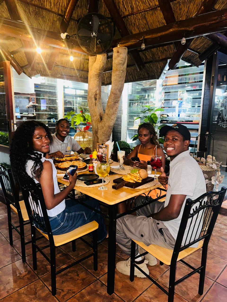 CCMT team collaboration session in modern office space with diverse professionals brainstorming